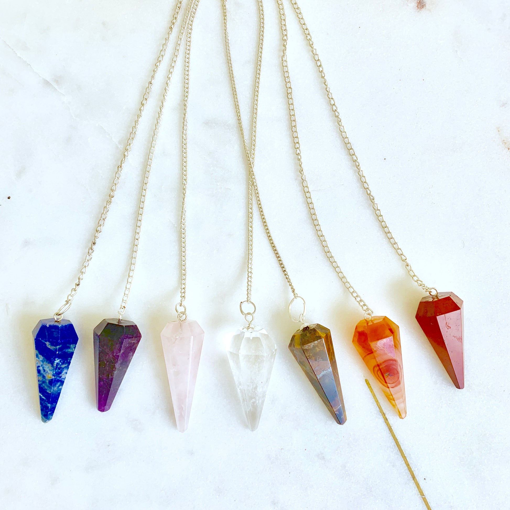 CRYSTAL PENDULUMS